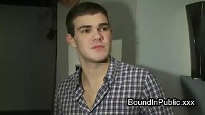 Bound gay sprayed with cum in public