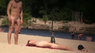 Men enjoying being nude at the nudist beach